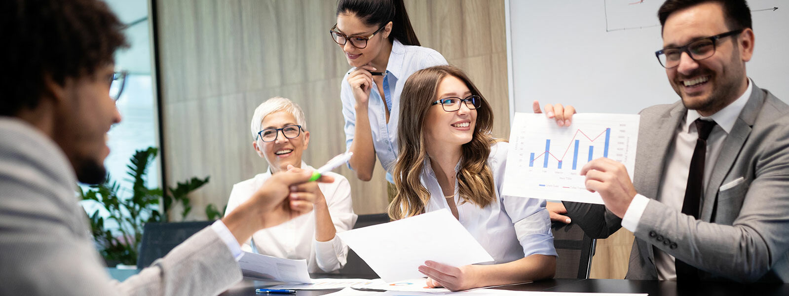 Photo of a team in their office workplace